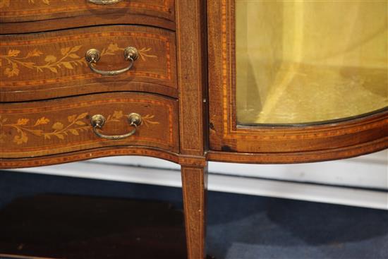 An Edwardian marquetry inlaid bowfronted china display cabinet, in the manner of Edwards & Roberts, H.6ft 6in. W.5ft 4in.